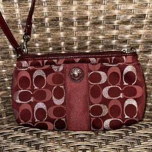 Coach Signature C Logo wristlet or pouch in burgundy and silver